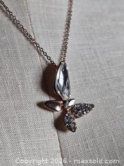 MaxSold Auction: Jewelry.  butterfly type pendant on  silver tone chain - Burnaby (British Columbia, Canada) SELLER MANAGED Downsizing Online Auction - Claude Avenue