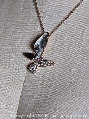 MaxSold Auction: Jewelry.  butterfly type pendant on  silver tone chain - Burnaby (British Columbia, Canada) SELLER MANAGED Downsizing Online Auction - Claude Avenue