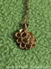 MaxSold Auction: Jewelry.   Dainty Gold tone flower pendant on gold tone chain - Burnaby (British Columbia, Canada) SELLER MANAGED Downsizing Online Auction - Claude Avenue