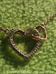 MaxSold Auction: Jewelry.   Double Heart gold tone necklace - Burnaby (British Columbia, Canada) SELLER MANAGED Downsizing Online Auction - Claude Avenue