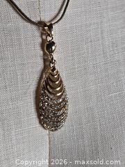 MaxSold Auction: Jewelry.   Gold tone chain with  Faux Gold/Diamond pendant - Burnaby (British Columbia, Canada) SELLER MANAGED Downsizing Online Auction - Claude Avenue