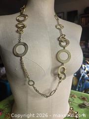 MaxSold Auction: Jewelry.   Gold tone circles on long chain.  Lia Sophia - Burnaby (British Columbia, Canada) SELLER MANAGED Downsizing Online Auction - Claude Avenue