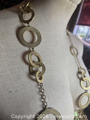 MaxSold Auction: Jewelry.   Gold tone circles on long chain.  Lia Sophia - Burnaby (British Columbia, Canada) SELLER MANAGED Downsizing Online Auction - Claude Avenue