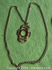 MaxSold Auction: Jewelry.  Gold tone large overlapping squares pendant - Burnaby (British Columbia, Canada) SELLER MANAGED Downsizing Online Auction - Claude Avenue