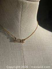 MaxSold Auction: Jewelry.  Gold tone LOVE necklace - Burnaby (British Columbia, Canada) SELLER MANAGED Downsizing Online Auction - Claude Avenue