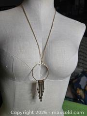 MaxSold Auction: Jewelry.   Industrial type necklace.  Large circle with hanging pieces - Burnaby (British Columbia, Canada) SELLER MANAGED Downsizing Online Auction - Claude Avenue