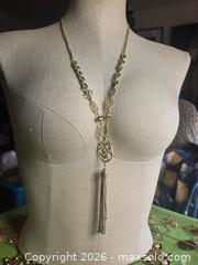 MaxSold Auction: Jewelry. Long silver tone multi link chain with long tassel - Burnaby (British Columbia, Canada) SELLER MANAGED Downsizing Online Auction - Claude Avenue