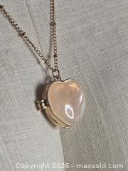 MaxSold Auction: Jewelry. Pink Stone Heart Locket on Gold tone chain - Burnaby (British Columbia, Canada) SELLER MANAGED Downsizing Online Auction - Claude Avenue