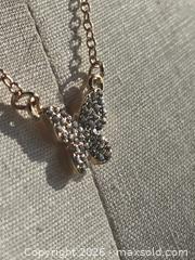 MaxSold Auction: Jewelry.  Shiny butterfly on Gold tone chain - Burnaby (British Columbia, Canada) SELLER MANAGED Downsizing Online Auction - Claude Avenue