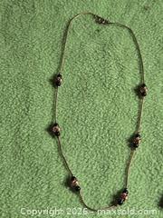 MaxSold Auction: Jewelry.  Thin gold tone chain with black / gold embellishments - Burnaby (British Columbia, Canada) SELLER MANAGED Downsizing Online Auction - Claude Avenue