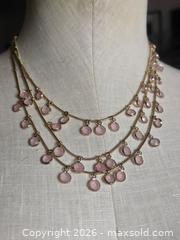 MaxSold Auction: Jewelry.  Triple Strand gold tone necklace with pink pendants.  Lia Sophia - Burnaby (British Columbia, Canada) SELLER MANAGED Downsizing Online Auction - Claude Avenue