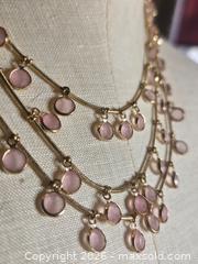 MaxSold Auction: Jewelry.  Triple Strand gold tone necklace with pink pendants.  Lia Sophia - Burnaby (British Columbia, Canada) SELLER MANAGED Downsizing Online Auction - Claude Avenue