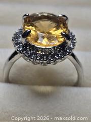 MaxSold Auction: Jewelry.  Yellow Stone silver tone ring. - Burnaby (British Columbia, Canada) SELLER MANAGED Downsizing Online Auction - Claude Avenue