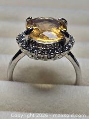 MaxSold Auction: Jewelry.  Yellow Stone silver tone ring. - Burnaby (British Columbia, Canada) SELLER MANAGED Downsizing Online Auction - Claude Avenue