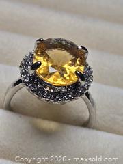 MaxSold Auction: Jewelry.  Yellow Stone silver tone ring. - Burnaby (British Columbia, Canada) SELLER MANAGED Downsizing Online Auction - Claude Avenue