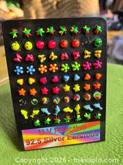 MaxSold Auction: New UV reactive colorful Small stud earrings.  with 925 backs. Jewelry. - Burnaby (British Columbia, Canada) SELLER MANAGED Downsizing Online Auction - Claude Avenue