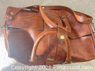 MaxSold Auction: CONCEPT Cognac Faux Distressed Leather Small Duffel / Weekender - Sarnia (Ontario, Canada) PARTNER MANAGED Downsizing Online Auction -  Palmerston Street