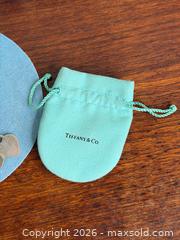 MaxSold Auction: Authentic TIFFANY & Co. Sterling Silver 'Return to Tiffany' Heart Charm Bracelet  - Hamilton (Ontario, Canada) SELLER MANAGED Estate Sale Online Auction - Gertrude Street