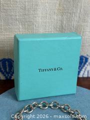MaxSold Auction: Authentic TIFFANY & Co. Sterling Silver 'Return to Tiffany' Heart Charm Bracelet  - Hamilton (Ontario, Canada) SELLER MANAGED Estate Sale Online Auction - Gertrude Street
