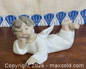 MaxSold Auction: Lladro Angels Angel Lying Down - Hamilton (Ontario, Canada) SELLER MANAGED Estate Sale Online Auction - Gertrude Street