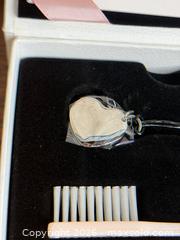 MaxSold Auction: NEW Pandora Jewelry Collectors Cleaning & Storage Kit - With Heart Logo Keychain - Hamilton (Ontario, Canada) SELLER MANAGED Estate Sale Online Auction - Gertrude Street