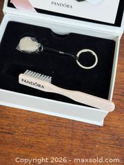 MaxSold Auction: NEW Pandora Jewelry Collectors Cleaning & Storage Kit - With Heart Logo Keychain - Hamilton (Ontario, Canada) SELLER MANAGED Estate Sale Online Auction - Gertrude Street