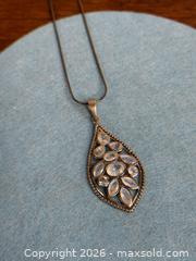 MaxSold Auction: Rainbow MOONSTONE Pendant in 925 STERLING SILVER with a Necklace - Hamilton (Ontario, Canada) SELLER MANAGED Estate Sale Online Auction - Gertrude Street