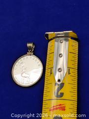 MaxSold Auction: 2018 $3 Caribou Canada 99.99% Pure Silver Coin in Sterling Silver 925 Pendant / Charm Frame - Cobourg (Ontario, Canada) SELLER MANAGED Moving Online Auction - Burnham Street