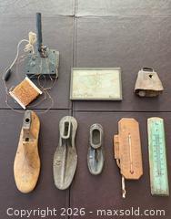 MaxSold Auction: Antique Cast Iron Shoe Molds, Cowbell, Thermometer & More! - Oxnard (California, USA) PARTNER MANAGED Estate Sale Online Auction - West Fifth Street