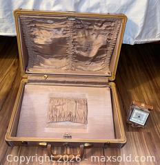 MaxSold Auction: Vintage Samsonite Art Deco Brown Hardcase & Endura Travel Clock - Oxnard (California, USA) PARTNER MANAGED Estate Sale Online Auction - West Fifth Street