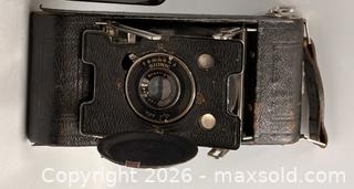 MaxSold Auction: Antique Ansco Vest Pocket No. 2 Folding Camera - Rare Camera - Bionic Lens, Folding Camera. Circa 1916. - Oakville (Ontario, Canada) PARTNER MANAGED Estate Sale Online Auction - Lakeshore Road West