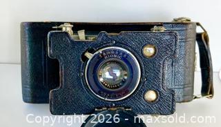 MaxSold Auction: Antique Ansco Vest Pocket No. 2 Folding Camera - Rare Camera - Bionic Lens, Folding Camera. Circa 1916. - Oakville (Ontario, Canada) PARTNER MANAGED Estate Sale Online Auction - Lakeshore Road West
