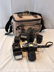 MaxSold Auction: Minolta XD-11 SLR 35mm Camera with 3 Interchangeable Lenses and Minolta Auto Flash - Oakville (Ontario, Canada) PARTNER MANAGED Estate Sale Online Auction - Lakeshore Road West