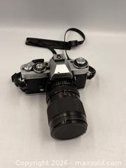 MaxSold Auction: Minolta XD-11 SLR 35mm Camera with 3 Interchangeable Lenses and Minolta Auto Flash - Oakville (Ontario, Canada) PARTNER MANAGED Estate Sale Online Auction - Lakeshore Road West