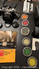 MaxSold Auction: Olympus OM-1 35mm SLR with 50mm f/1.4 Lens - Oakville (Ontario, Canada) SELLER MANAGED Estate Sale Online Auction - Cornwall Road (STORAGE)