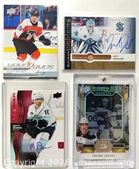 MaxSold Auction: Lot of 4 Upper Deck Hockey Trading Cards — Michkov, Daccord, Beniers, Zegras - Cobourg (Ontario, Canada) SELLER MANAGED Reseller Online Auction - Elgin Street West