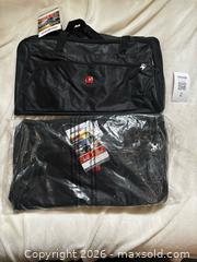 MaxSold Auction: SwissGear Black Medium Duffel Travel Bag, Lot of 2 - Milton (Ontario, Canada) SELLER MANAGED Moving Online Auction - Fourth Line
