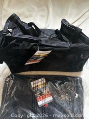 MaxSold Auction: SwissGear Black Medium Duffel Travel Bag, Lot of 2 - Milton (Ontario, Canada) SELLER MANAGED Moving Online Auction - Fourth Line