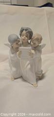 MaxSold Auction: Lladro Porcelain Angel Choir Children Figurine, White - Tacoma (Washington, USA) SELLER MANAGED Downsizing Online Auction -  S Alder Street