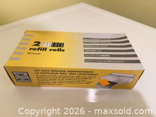 MaxSold Auction: FoodSaver VacLoc Vacuum Sealer with VacLoc Rolls B - Barrie (Ontario, Canada) Downsizing Online Auction - Wessenger Drive