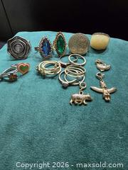 MaxSold Auction: Costume Jewelry Lot – Rings & Charms - Vancouver (British Columbia, Canada) SELLER MANAGED Reseller Online Auction - East 7th Avenue (STORAGE)