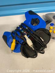 MaxSold Auction: Nintendo 64 Controllers Lot with OEM Power Adapter - Vancouver (British Columbia, Canada) SELLER MANAGED Reseller Online Auction - East 7th Avenue (STORAGE)