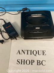 MaxSold Auction: Sega Genesis Console with Controller & Power Adapter - Vancouver (British Columbia, Canada) SELLER MANAGED Reseller Online Auction - East 7th Avenue (STORAGE)