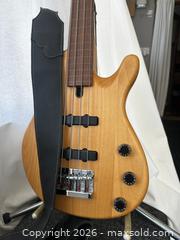 MaxSold Auction: Yamaha Fretless 4-string Bass Guitar (Like New) - San Francisco (California, USA) SELLER MANAGED Downsizing Online Auction - Hudson Avenue