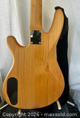 MaxSold Auction: Yamaha Fretless 4-string Bass Guitar (Like New) - San Francisco (California, USA) SELLER MANAGED Downsizing Online Auction - Hudson Avenue