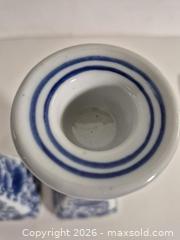 MaxSold Auction: Pair of Blue and White Taper Ceramic Candle Holders - Oshawa (Ontario, Canada) SELLER MANAGED Commercial Liquidation Online Auction - Bond Street West