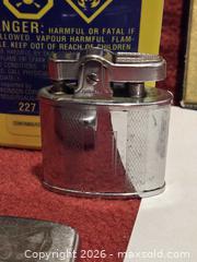 MaxSold Auction: Tape Measure & Lighters  - Hamilton (Ontario, Canada) SELLER MANAGED Estate Sale Online Auction -  Glendale Avenue South