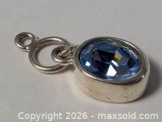 MaxSold Auction: Sterling Silver Blue Topaz Pendant  - Kingston (Ontario, Canada) SELLER MANAGED Downsizing Online Auction - Woodbine Road