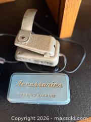 MaxSold Auction: Vintage White Teal Japan Rotary Belt Sewing Machine & Accessories  - Saratoga (California, USA) SELLER MANAGED Estate Sale Online Auction - Allendale Avenue