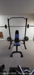 MaxSold Auction: Weight lifting rack, bench, Olympic bar, plates  - Ottawa (Ontario, Canada) SELLER MANAGED Downsizing Online Auction - Mowat Street
